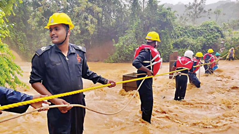 Rescue operation under way in one of the flood-hit villages in Kodagu on Friday (Photo: DC)