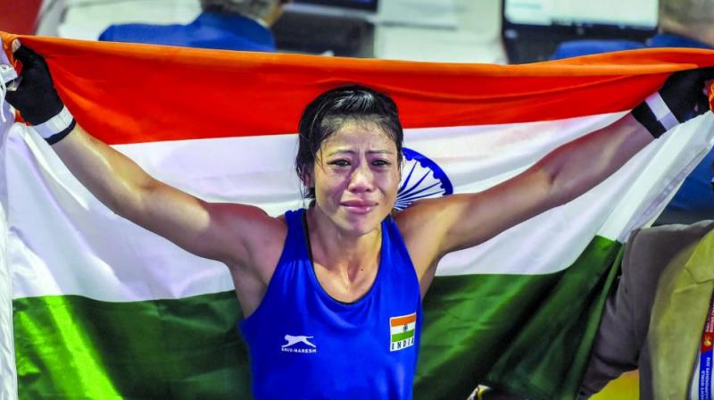 Boxer Mary Kom gets emotional after winning the final match of womens light flyweight categoty against Ukraines Hanna Okhota, 13 years her junior, at AIBA Womens World Boxing Championships in New Delhi. (Photo: PTI)