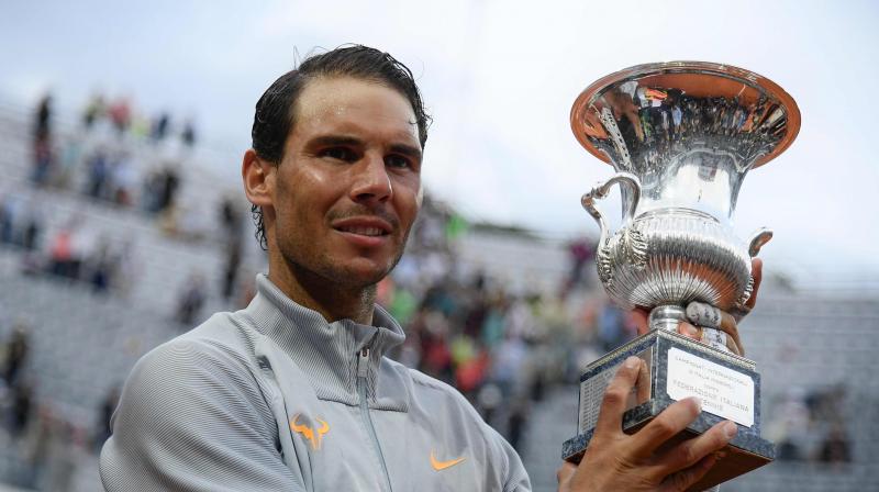 Rafa Nadal returned to the top of the world rankings on Monday after winning his eighth Italian Open title at the weekend to confirm once more his status as the king of the clay court. (Photo: AFP)