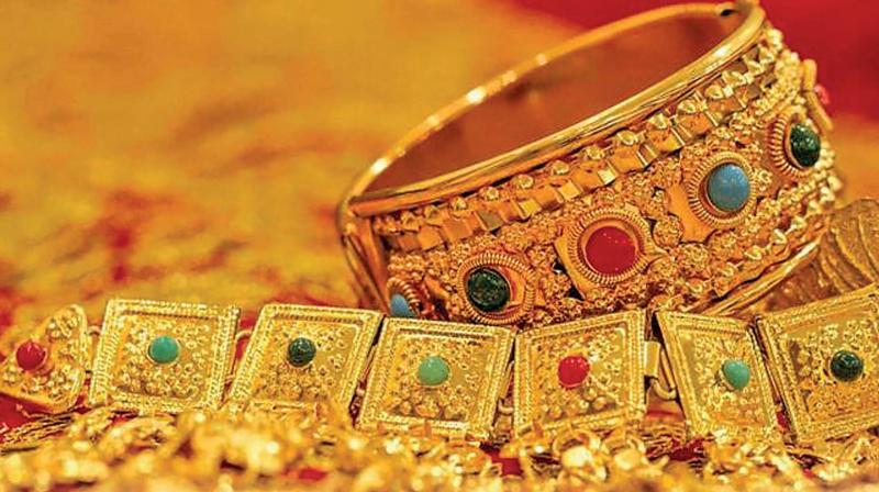 Gold touches fresh all-time high of Rs 38,770 on jewellers\ buying