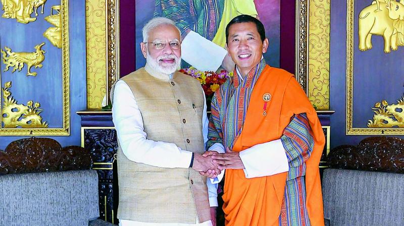 Prime Minister Narendra Modi and the Prime Minister of Bhutan Lotay Tshering, at a meeting in Thiphu, Bhutan on Saturday. (Photo: PTI)