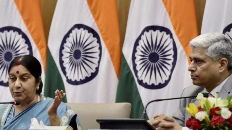 External Affairs Minister Sushma Swaraj and MEA spokesperson Vikas Swarup (Photo: PTI)