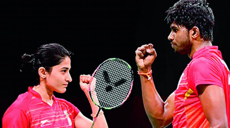 Ashwini Ponnappa (left) and Rankireddy Satwiksairaj celebrate a point during a match in this file photo.