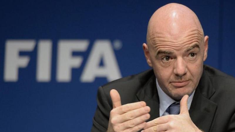 FIFA chief says racism \not acceptable\ in Italian football