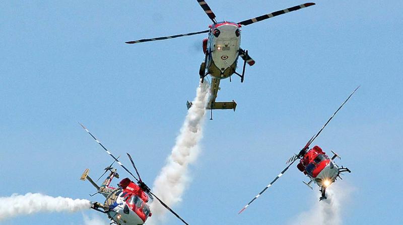 Air Force personnel stage a live demonstration of aerial acts in presence of Prime Minister Narendra Modi after the inauguration of 10th edition of Indias Mega Defence Exhibition - DefExpo 2018, on Thursday.(Photo: DC)