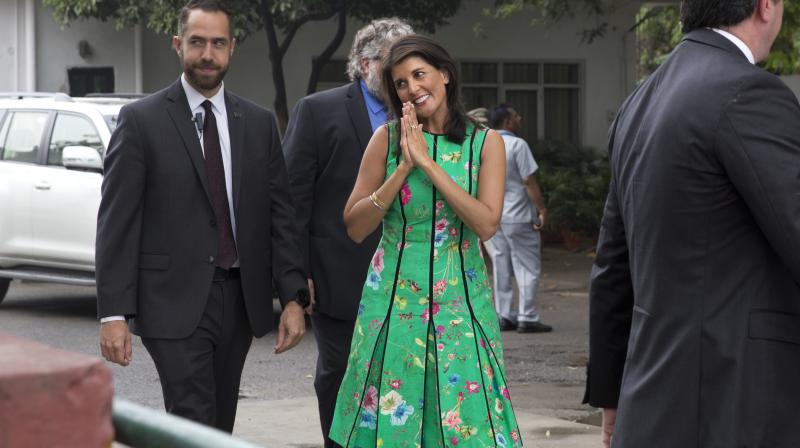 US Ambassador to United Nations Nikki Haley greets as she arrives at Sunder nursery in New Delhi on Wednesday. (Photo: AP)