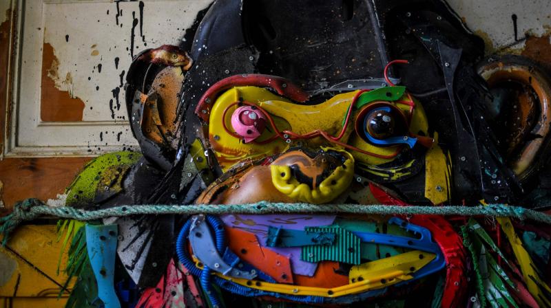 A picture shows an artwork by Portuguese artist Artur Bordalo who goes by the artistic name Bordalo II in his studio in Lisbon on May 3, 2018. (Photo: AFP)