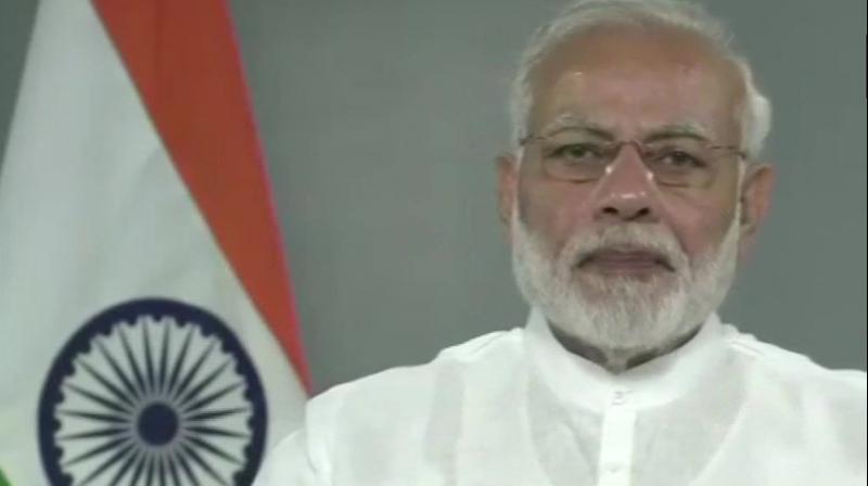 PM Modi joined special ceremony through video conference at Dunsinane Estate, Nuwara Eliya to hand over houses built under Indian Housing Project in Plantation Areas. (Photo: ANI | Twitter)