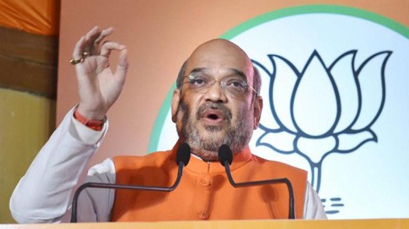 BJP President Amit Shah addresses during the party manifesto release for the upcoming Uttar Pradesh assembly elections in Lucknow. (Photo: AP)