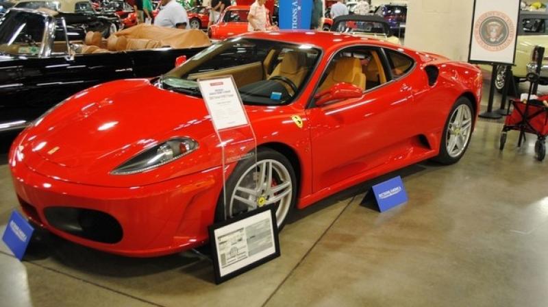 A Ferrari F430 owned by US president Donald J Trump in 2007 is exhibited by Autcions America in Fort Lauderdale, Florida. (Photo: AFP)