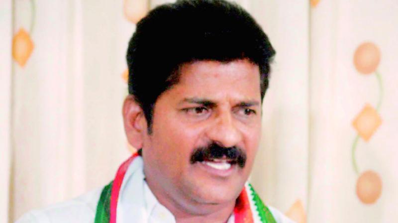 A Revanth Reddy seeks action against TPCC chief