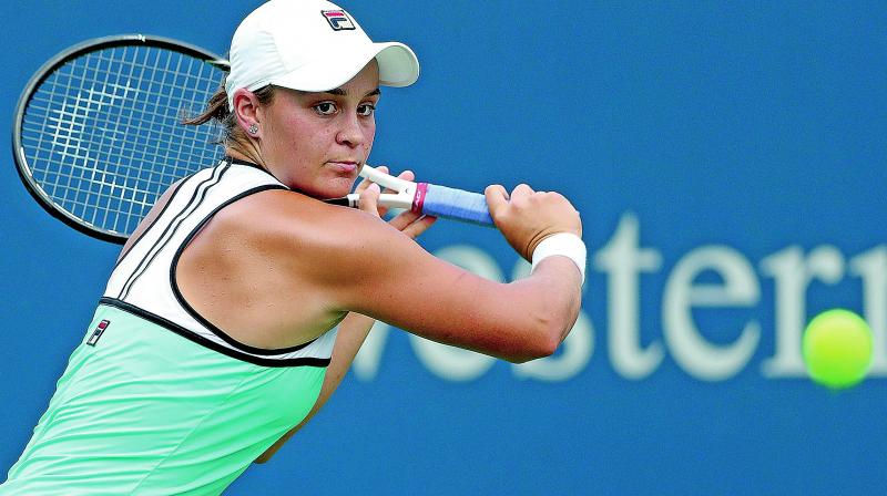 Top seed Ashleigh Barty in action against Maria Sharapova. (Photo: AP)