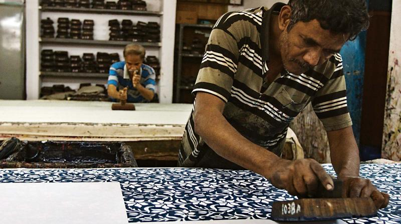 Mix, dip and press: Artisans hard at work in Tharangini, Bengaluru.