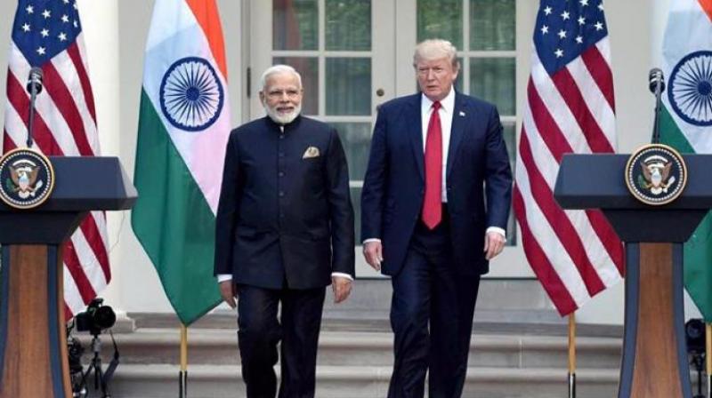 Small gains for Modi, Trump from Houston