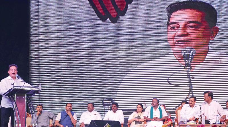 Actor Kamal Haasan addresses the meeting after launching his political party in front of a huge crowd at Othakadai in Madurai on Wednesday. (Photo: K. Manikandan)