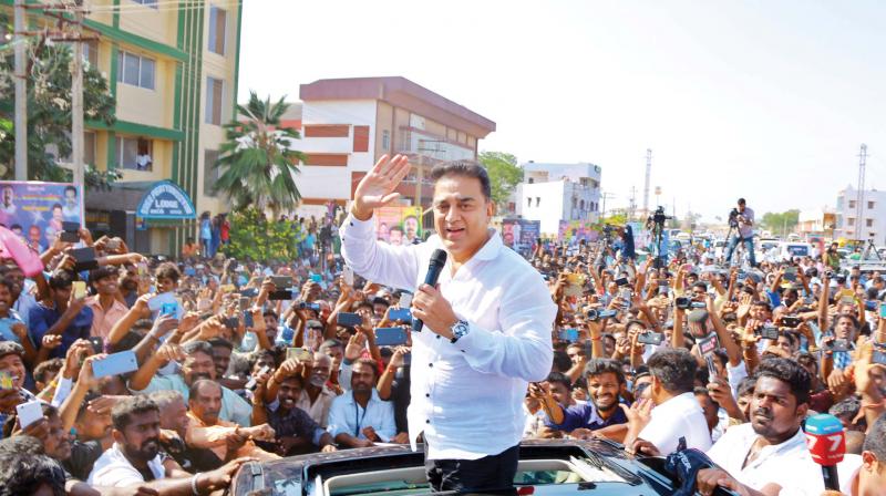 Kamal Haasan greets his fans in Madurai on Wednesday. (Photo: DC)