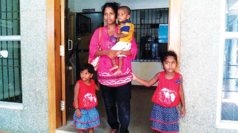 Thangam, with her three children, Lakshika Aisthika, and bay Subeekshan. (Photo: DC)