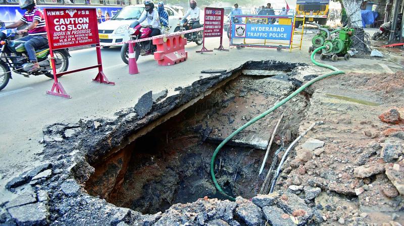 A sinkhole developed in front of Kamat Hotel, Secunderabad, on Wednesday night.