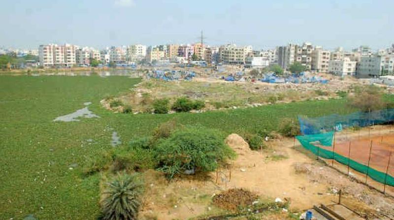 The government has readied an e-auction notification, putting 400 acres of different land parcels on the city outskirts for sale.