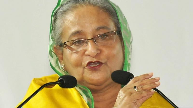 Bangladesh Prime Minister Sheikh Hasina addresses during the Special Convocation of Kazi Nazrul University at Asansol in West Burdwan district of West Bengal on Saturday. (Photo: PTI)