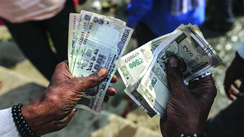 Rupee slips against dollar in opening trade
