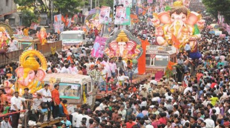 Khairatabad Ganesh Utsav Committee chairman, Sudarshan said on Sunday that the idol would be 57 feet tall, 1 foot shorter than last time.