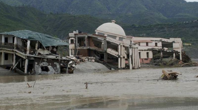 More than 50,000 people were stranded after the floods swept away buildings and triggered landslides. (Photo: PTI)