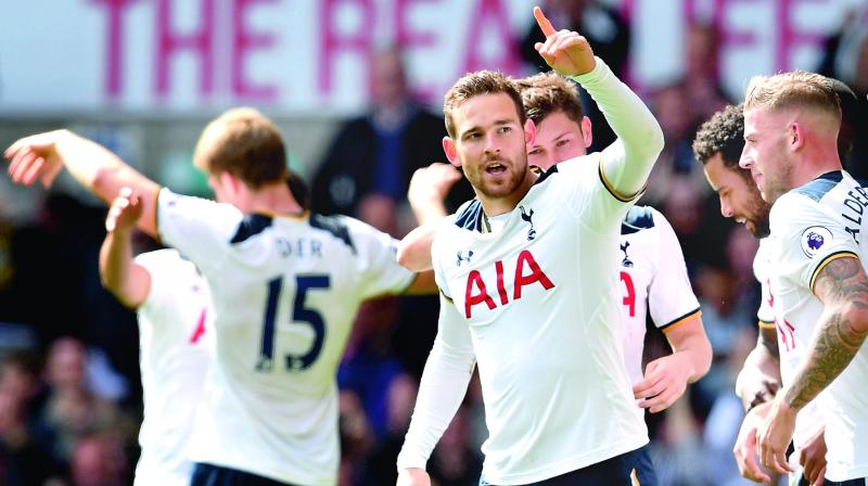 Vincent Janssen (centre) celebrates with teammates after scoring Tottenham Hotspurs fourth goal in their English Premier League match against Bournemouth at White Hart Lane in London on Saturday. Tottenham won 4-0. (Photo: AFP)
