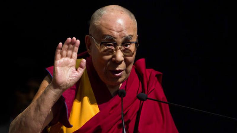 Tibetan spiritual leader the Dalai Lama delivers a lecture on \Ancient Indian Knowledge in Modern Times\ at the Guwahati university campus in Assam. (Photo: AP)