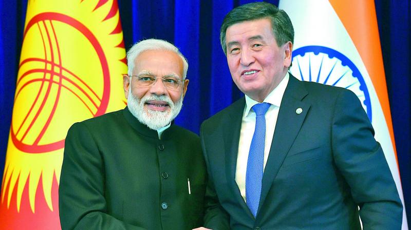 Prime Minister Narendra Modi and Kyrgyz President Sooronbai Jeenbekov at the end of a joint press conference in Bishkek on Friday.  (AFP)
