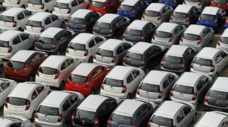 More auto firms halt production