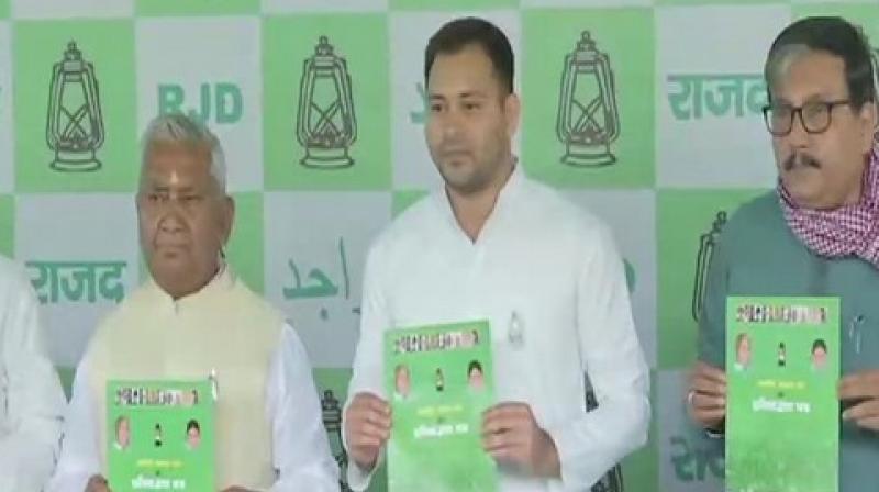 RJD releases manifesto, promises reservation to Dalits, backward classes