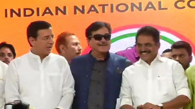 Shatrughan Sinha joins Cong; terms BJP \one-man show, two-men army\