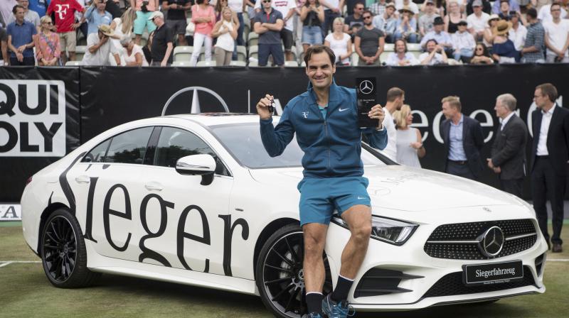 Federer  will regain the world number one ranking on Monday and is playing next week as top seed in Halle. (Photo: AP)