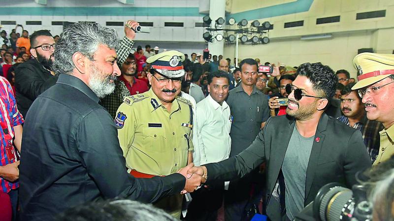 Actor Allu Arjun and film director Rajamouli at the traffic awareness programme for college students as Commissioner of Police Mahender Reddy looks on in Srinagar colony on Wednesday. (Photo:DC)
