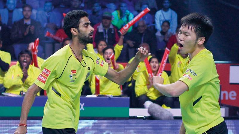Chennai Smashers B. Sumeeth Reddy and Lee Yang in action against Ivanov and Sozonov of Delhi Dashers  in their PBL trump match in Lucknow on Wednesday.