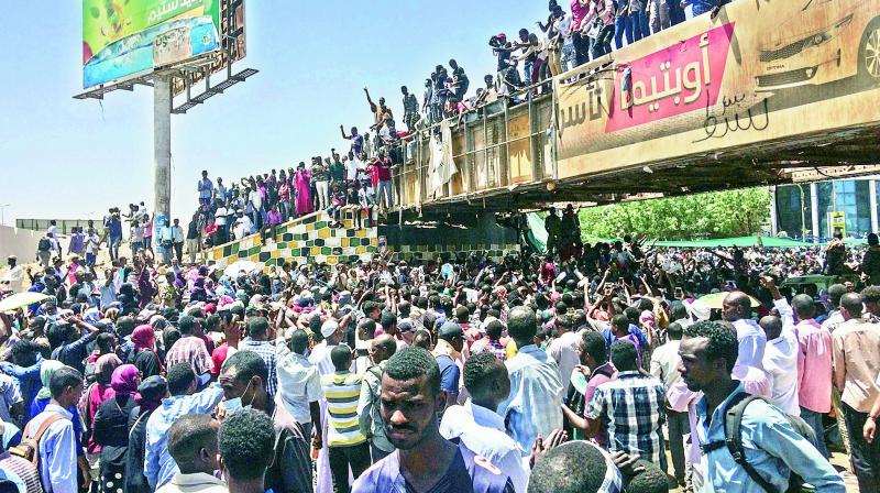 Protesters rally in front of the military headquarters in the capital Khartoum, Sudan, on Monday. Organisers behind the anti-government demonstrations said security forces attempted to break up a sit-in outside the military headquarters. (Photo: AP)