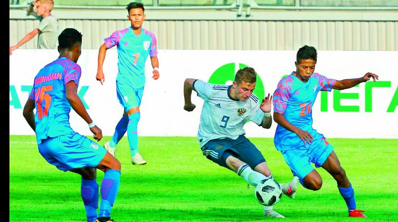 A photo released by the Football Union of Russia shows an Indian player (in blue) in action against Russia in the Granatkin Memorial Tournament earlier this month.