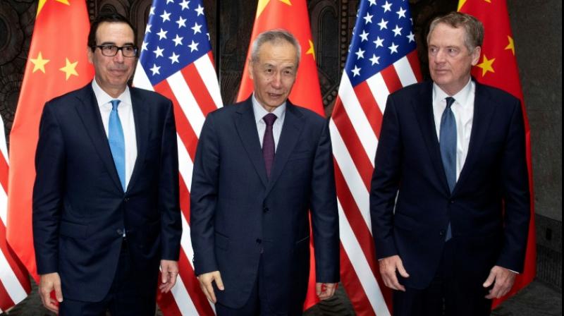 US Trade Representative Robert Lighthizer and Treasury Secretary Steven Mnuchin shook hands with Vice Premier Liu He Wednesday morning before the group went behind closed doors for the twelfth round of bilateral talks between the worlds two largest economies. (Photo: AFP