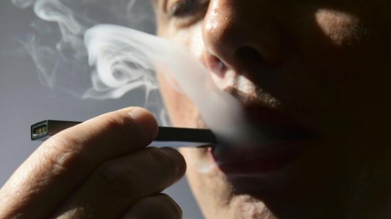 There are now more than 450 possible cases of pulmonary illness associated with vaping. (AFP)