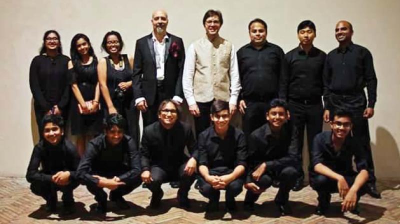 The Indian team in Narni, Italy with Meastro Alessandro Viale and Micheal Makhal. Mr Omprakash Roy (standing second from right), Head of music and theatre department, Greenwood High International School, is also seen