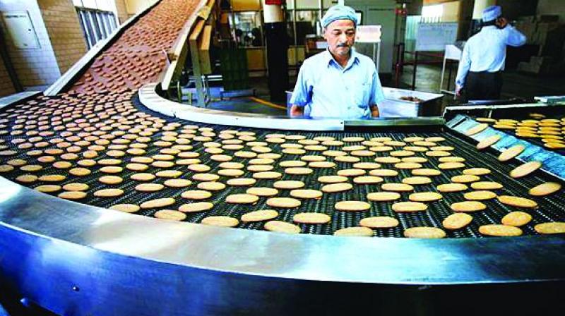Parle may lay-off 10,000 as GST, slowdown hurt
