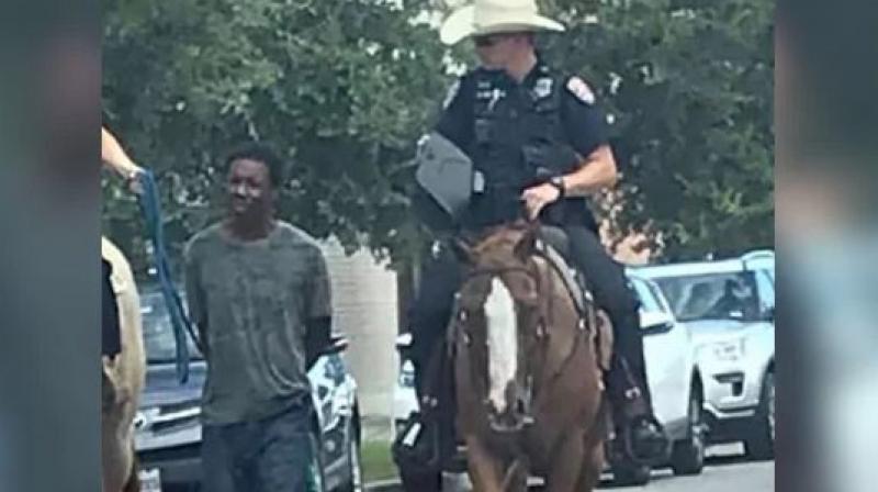 Photo of officers leading black man by rope in Texas sparks outrage