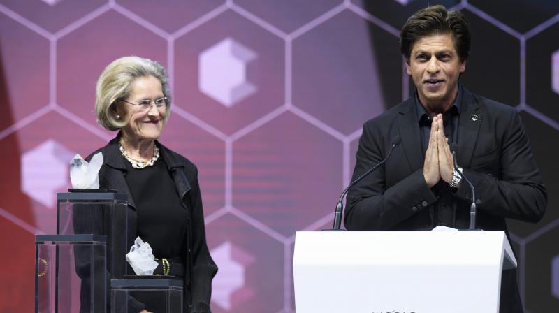 After thanking the World Economic Forum for the award, Shah Rukh Khan finished his speech with namaskar and Jai Hind. (Photo: AP)