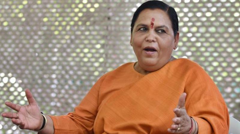 Union Minister for Drinking Water and Sanitation Uma Bharti said, she would not even run for the Rajya Sabha, but would campaign for the party, if asked. (Photo: AP)
