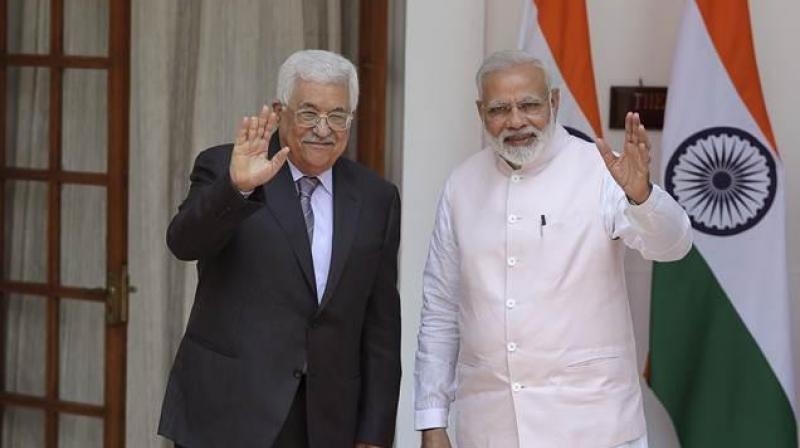 Narendra Modi (R), the first Indian Prime Minister to visit Palestine, is reaching Ramallah on Saturday amid heightened tensions. (Photo: AP)