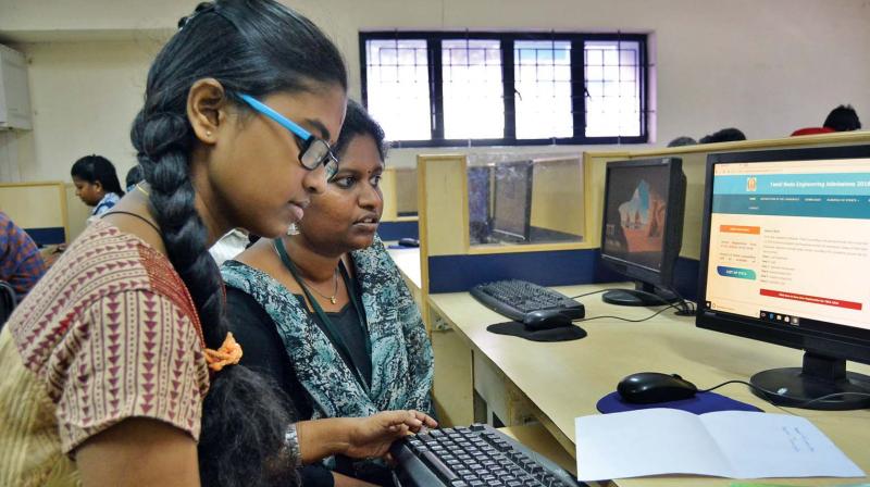 Students registering online application for engineering counselling at Ramanujan Computing Centre in Anna University on Thursday. (Photo: DC)