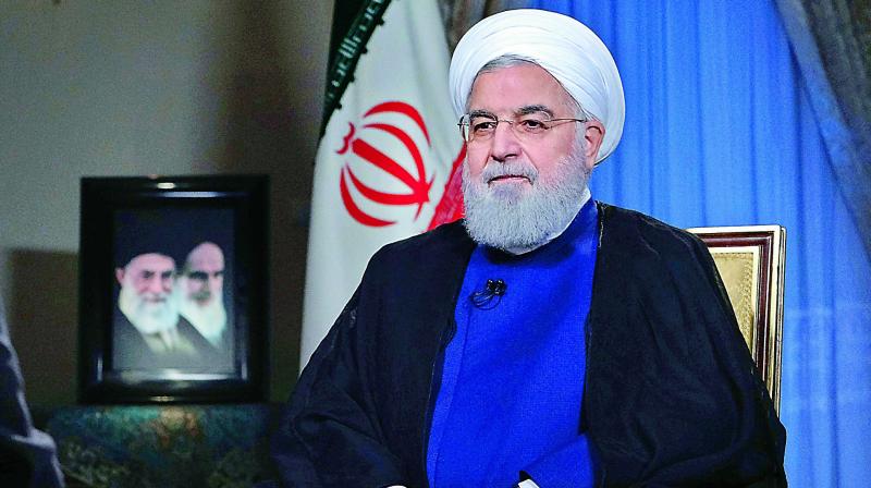 Irans President Hassan Rouhani addresses the nation in a televised speech in Tehran on Monday.