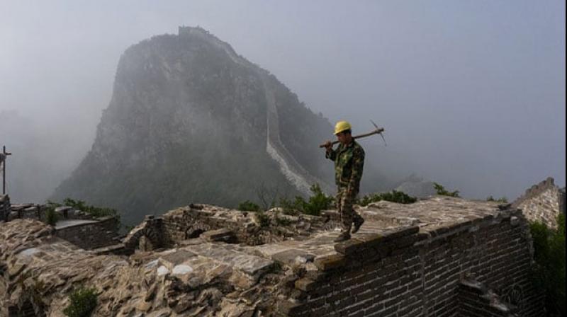 Mules, tools and old bricks: Rebuilding Great Wall of China