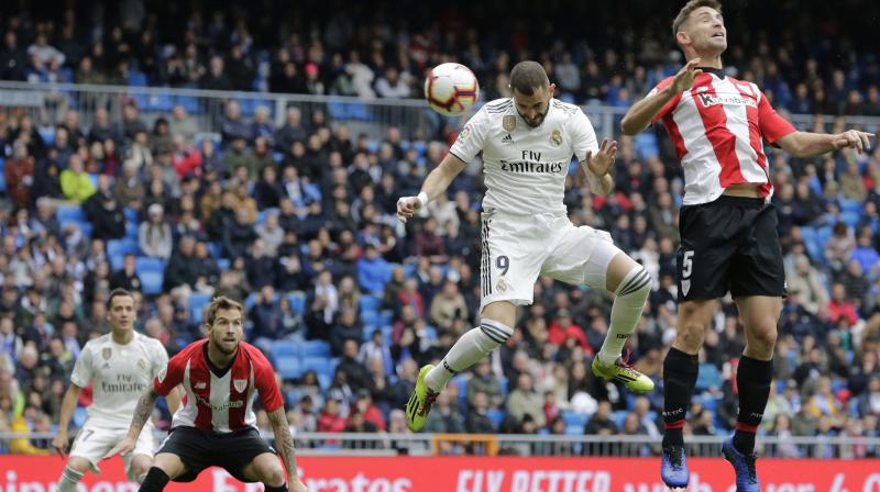 Real Madrid back to winning ways with Benzema\s hat-trick against Athletic Bilbao